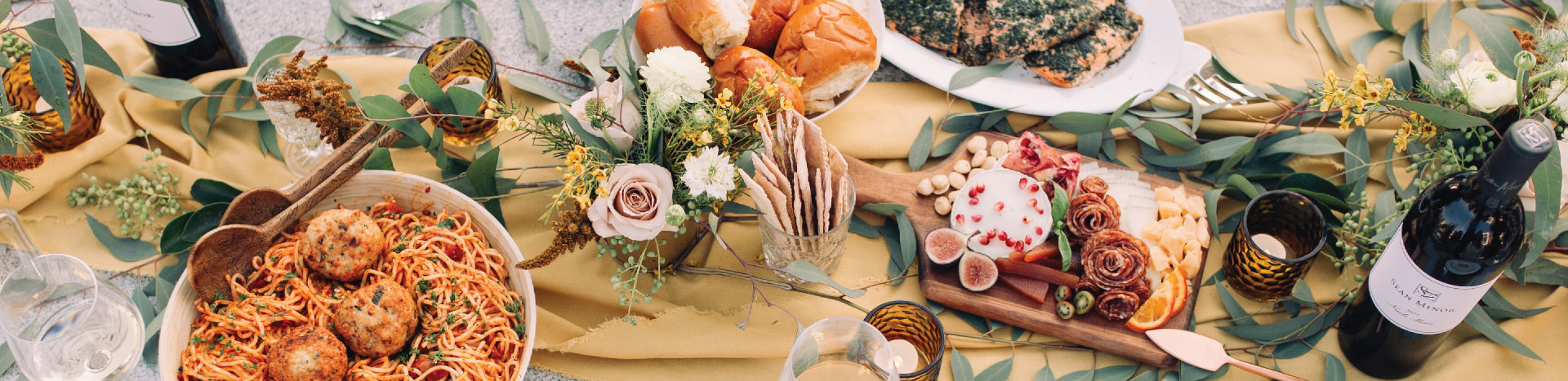 Sean Minor Wines beside a charcuterie board