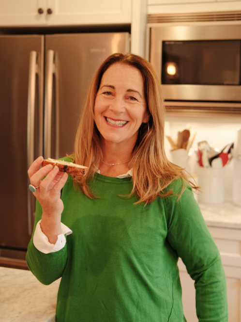 kristi smiling holding irish soda bread