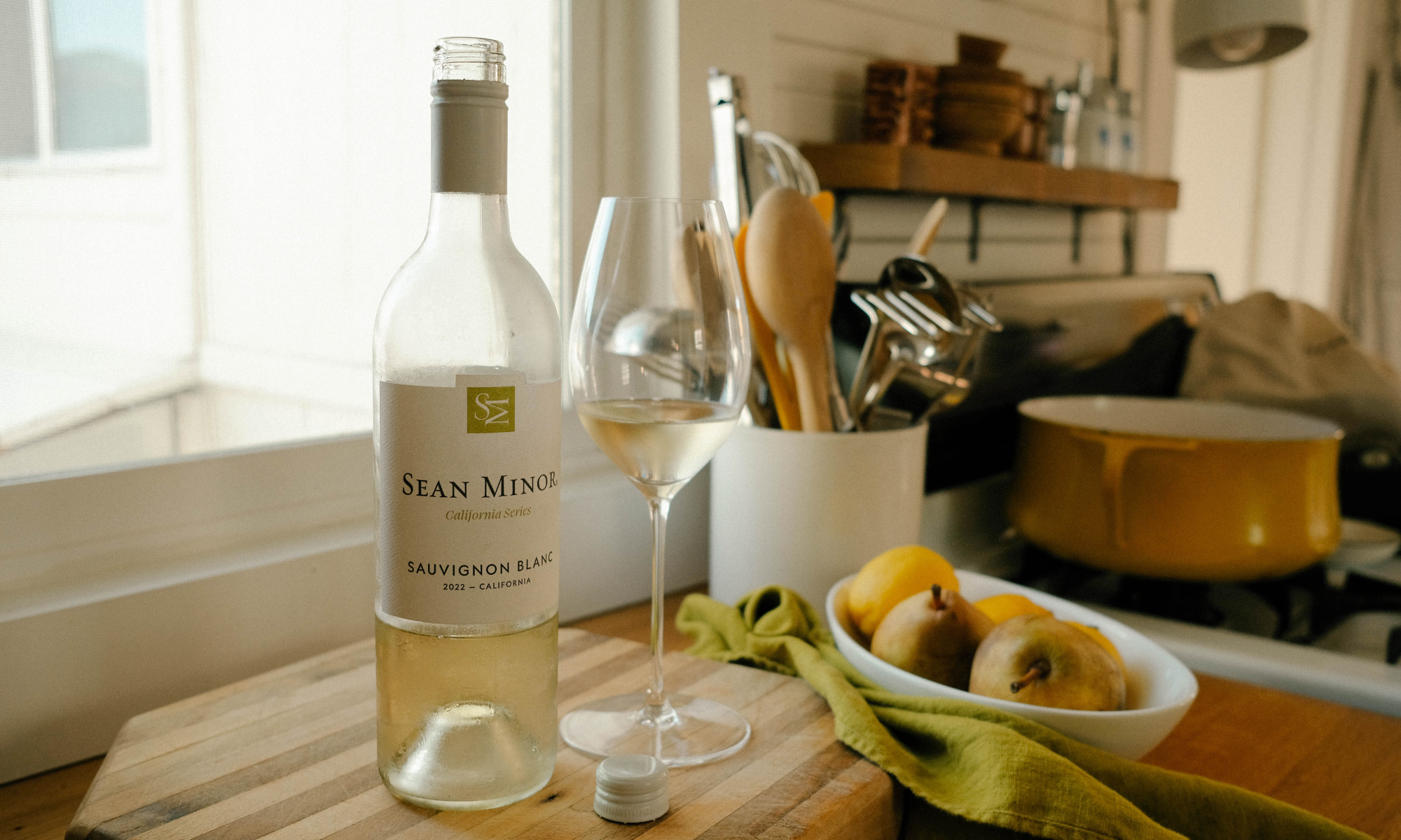 glass and bottle of sauvignon blanc