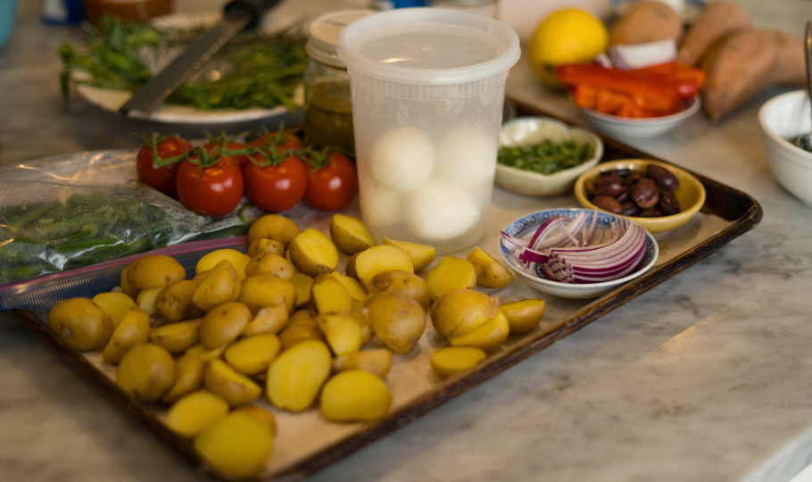ingredients of potato salad on sheet pan