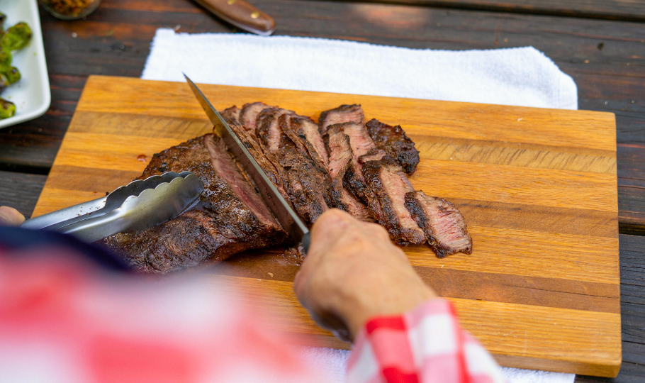 plate of steak being cut